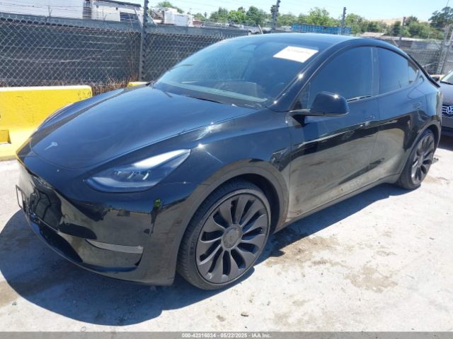 2024 TESLA MODEL Y 7SAYGDEF4RF068290 Photo 1
