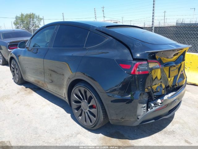 2024 TESLA MODEL Y 7SAYGDEF4RF068290 Photo 2