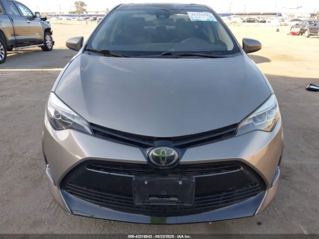 5YFBURHE1JP815493 Toyota Corolla Xle