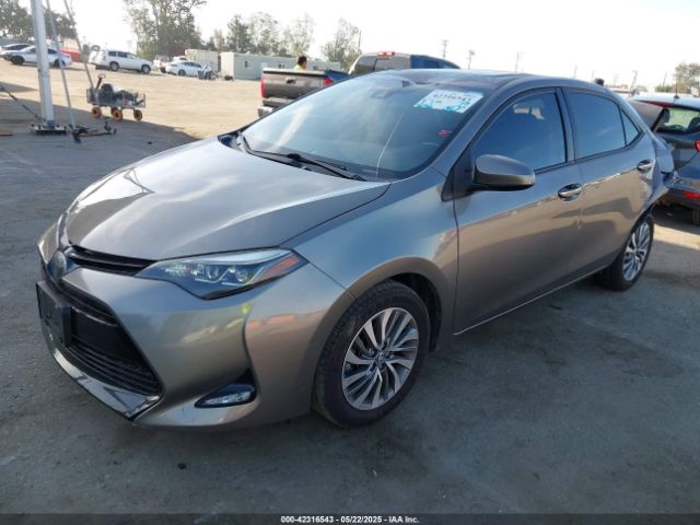 5YFBURHE1JP815493 Toyota Corolla Xle