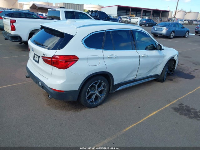 WBXHU7C37J5H41729 BMW X1