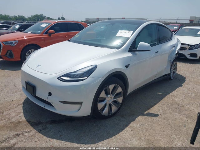 2023 TESLA MODEL Y 7SAYGDEE8PA094957 Photo 1