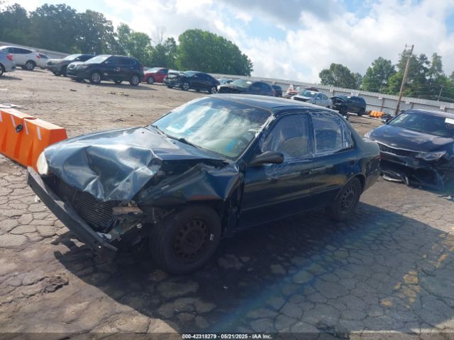 1999 TOYOTA COROLLA 1NXBR12E3XZ218901 Photo 1