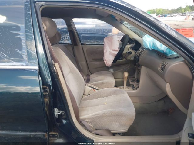 1999 TOYOTA COROLLA 1NXBR12E3XZ218901 Photo 4