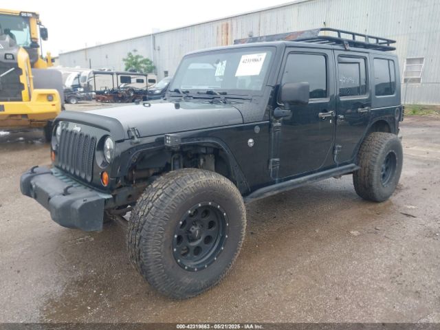 2010 JEEP WRANGLER UNLIMITED 1J4BA5H17AL114104 Photo 1