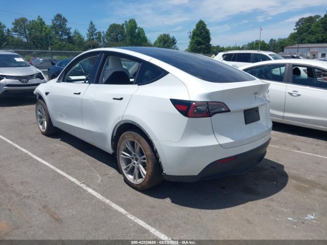 2023 TESLA MODEL Y 7SAYGDED2PF931521 Photo 2