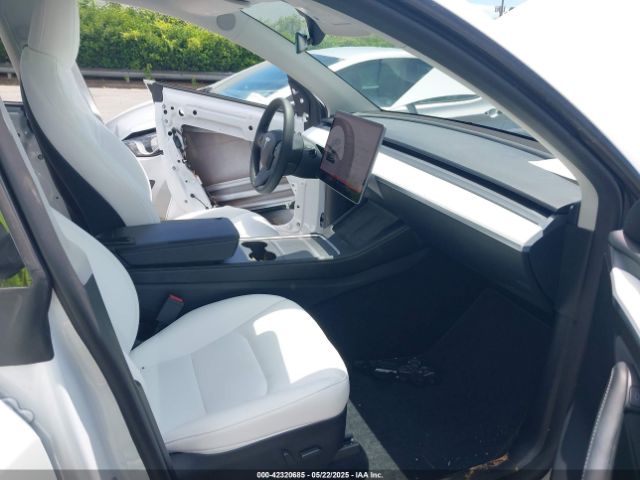 2023 TESLA MODEL Y 7SAYGDED2PF931521 Photo 4
