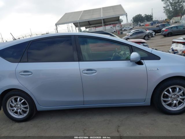 JTDZN3EU0EJ011989 Toyota Prius V Three