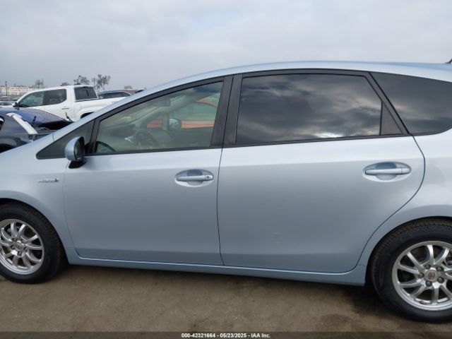 JTDZN3EU0EJ011989 Toyota Prius V Three
