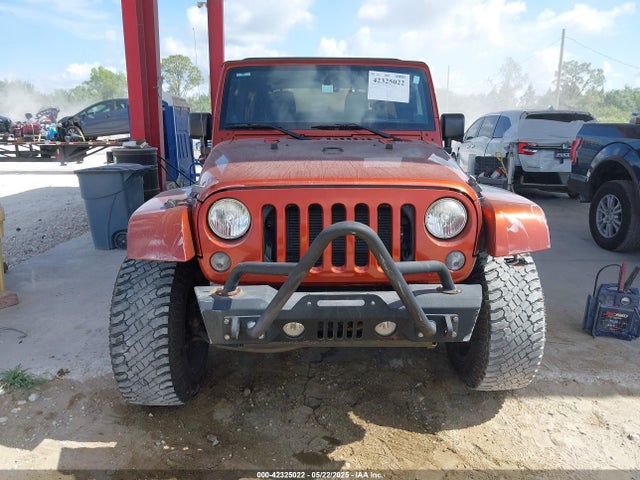 1C4BJWEG1EL209431 Jeep Wrangler Unlimited Sahara