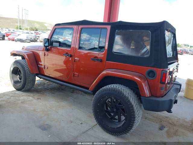 1C4BJWEG1EL209431 Jeep Wrangler Unlimited Sahara