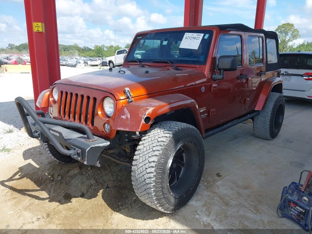 1C4BJWEG1EL209431 Jeep Wrangler Unlimited Sahara