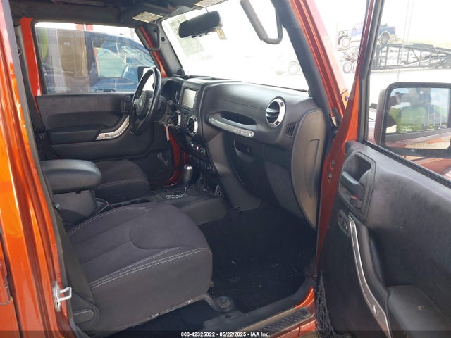 1C4BJWEG1EL209431 Jeep Wrangler Unlimited Sahara