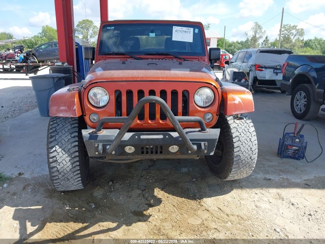 1C4BJWEG1EL209431 Jeep Wrangler Unlimited Sahara