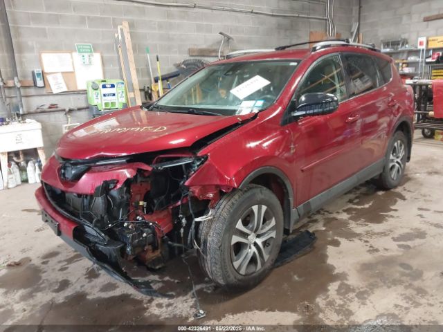 JTMBFREV1JD224498 Toyota RAV4 LE
