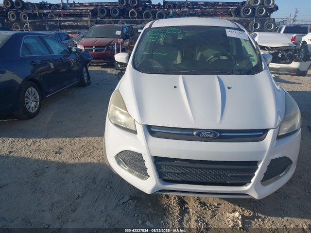 1FMCU0GX1EUA89352 Ford 2014