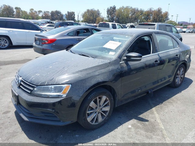 3VWD07AJ1FM284890 Volkswagen Jetta