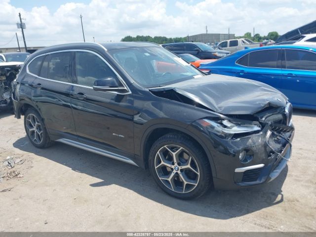 2017 BMW X1 WBXHT3Z30H4A65417
