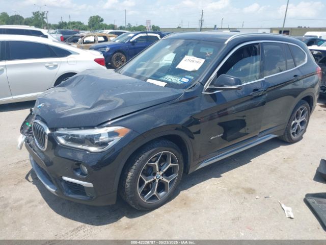 2017 BMW X1 WBXHT3Z30H4A65417 Photo 1