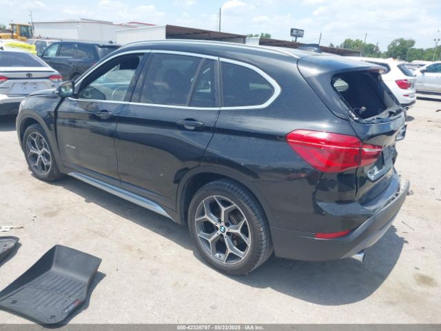 2017 BMW X1 WBXHT3Z30H4A65417 Photo 2