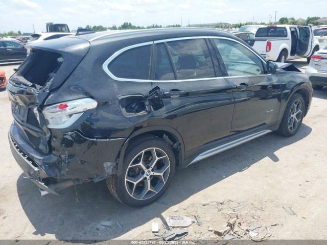 2017 BMW X1 WBXHT3Z30H4A65417 Photo 3