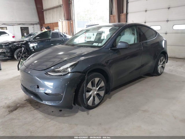 2022 TESLA MODEL Y 7SAYGAEE0NF567801 Photo 1