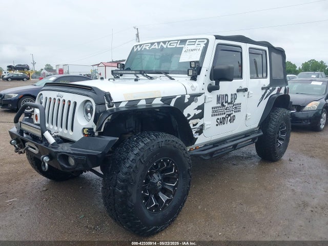 1C4BJWEG4EL197047 Jeep Wrangler Unlimited Sahara