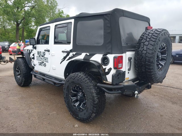 1C4BJWEG4EL197047 Jeep Wrangler Unlimited Sahara