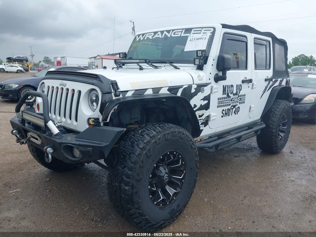 1C4BJWEG4EL197047 Jeep Wrangler Unlimited Sahara
