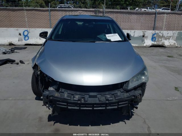 4T1BF1FK2GU202374 Toyota CAMRY SE