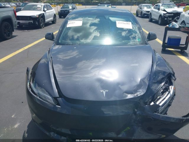 5YJ3E1EB8RF797501 Tesla 2024