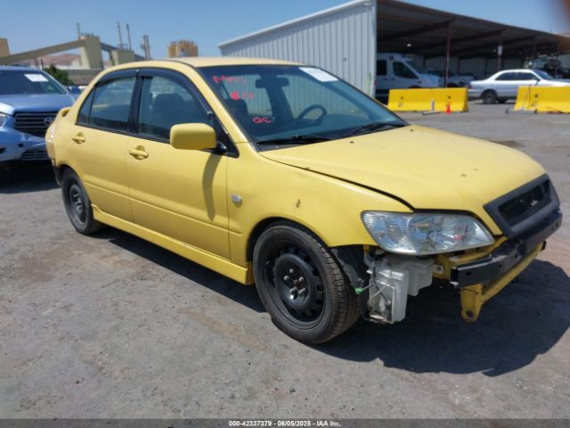 2002 MITSUBISHI LANCER JA3AJ86EX2U073129