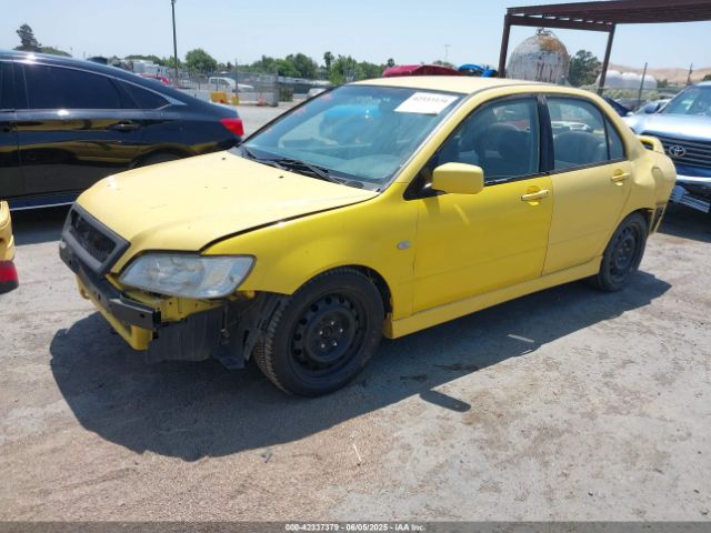 2002 MITSUBISHI LANCER JA3AJ86EX2U073129 Photo 1