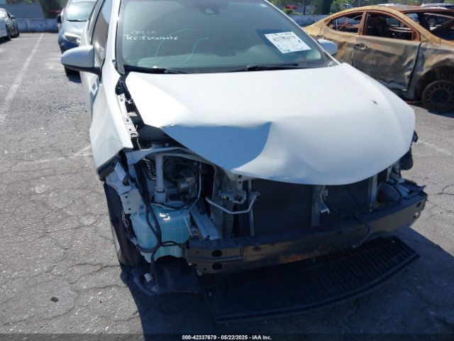 5YFBURHE1JP813372 Toyota Corolla Xle