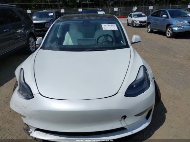 5YJ3E1EB3NF203181 Tesla 2022