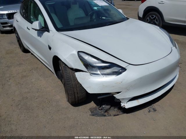 5YJ3E1EB3NF203181 Tesla 2022