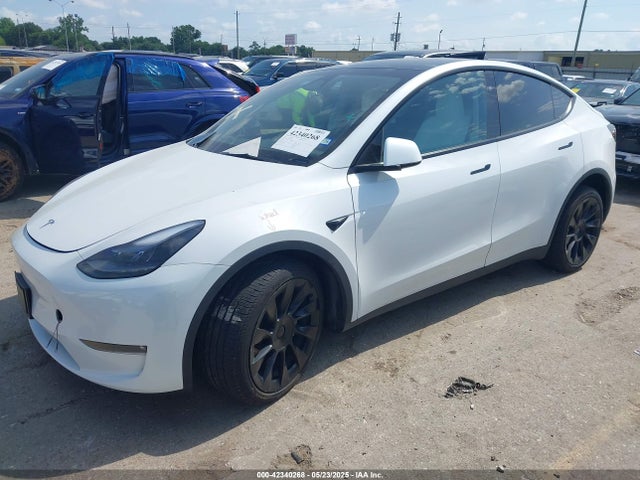 2023 TESLA MODEL Y 7SAYGAEE4PF885925 Photo 1