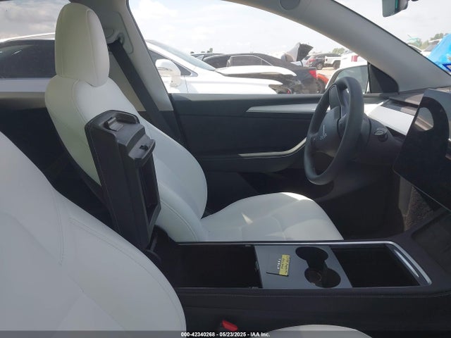 2023 TESLA MODEL Y 7SAYGAEE4PF885925 Photo 4