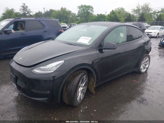 2021 TESLA MODEL Y 5YJYGAEE5MF130677 Photo 1