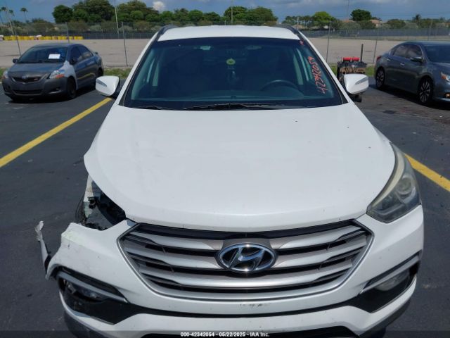 5NMZU3LB9HH034850 Hyundai Santa Fe Sport 2.4l