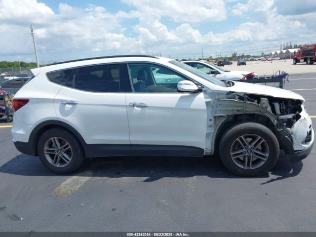 5NMZU3LB9HH034850 Hyundai Santa Fe Sport 2.4l