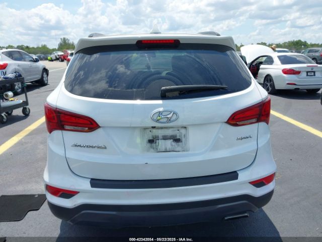 5NMZU3LB9HH034850 Hyundai Santa Fe Sport 2.4l