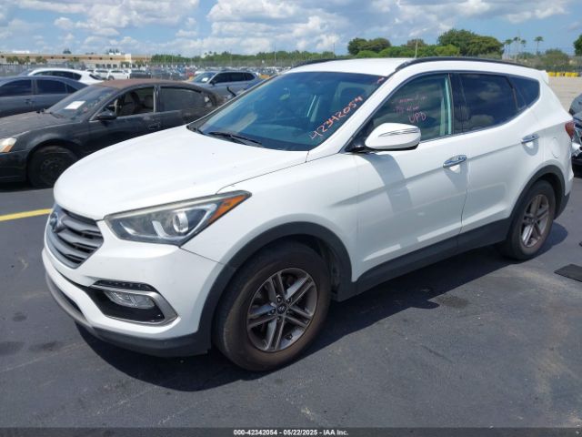 5NMZU3LB9HH034850 Hyundai Santa Fe Sport 2.4l