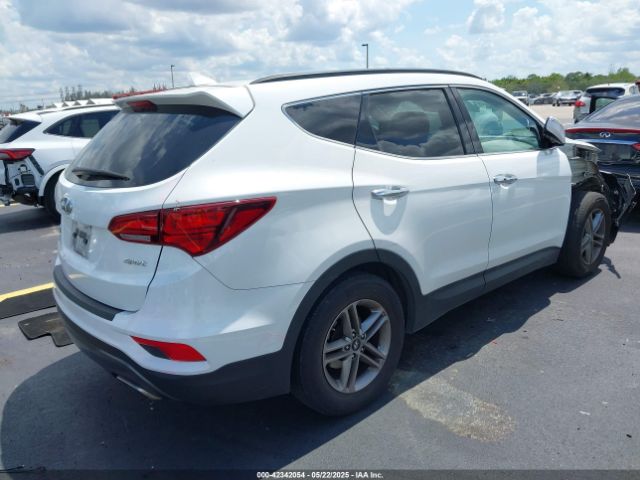 5NMZU3LB9HH034850 Hyundai Santa Fe Sport 2.4l