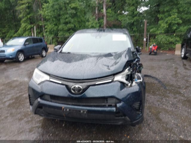 JTMBFREV2JJ206013 Toyota RAV4 LE