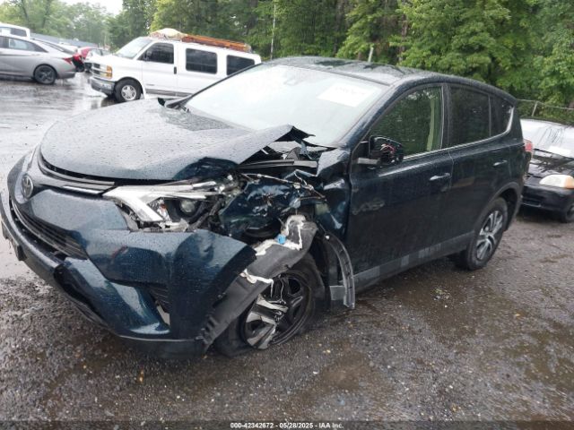 JTMBFREV2JJ206013 Toyota RAV4 LE