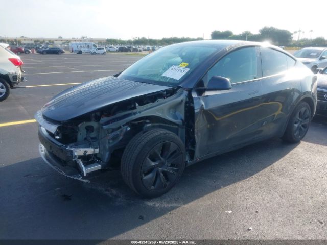 2024 TESLA MODEL Y 7SAYGDED3RA329355 Photo 1