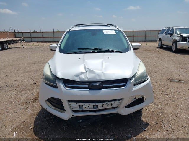 1FMCU0J92EUE38738 Ford 2014