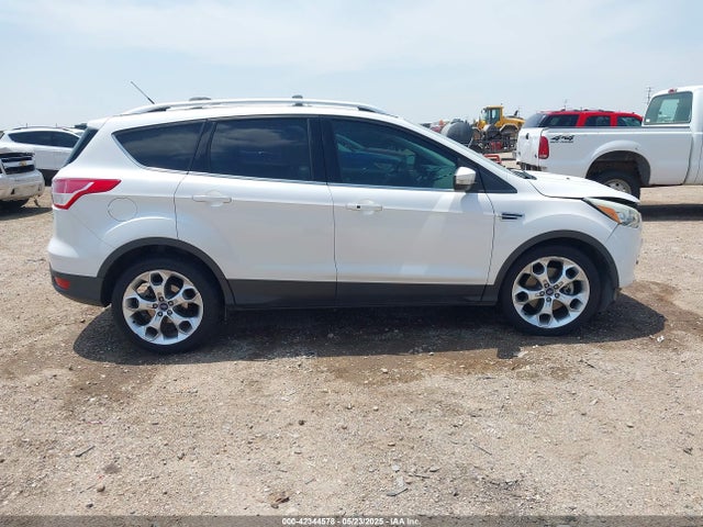 1FMCU0J92EUE38738 Ford 2014