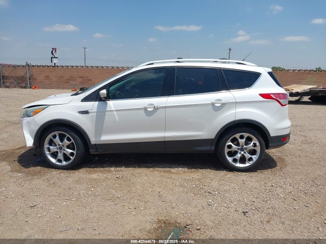 1FMCU0J92EUE38738 Ford 2014